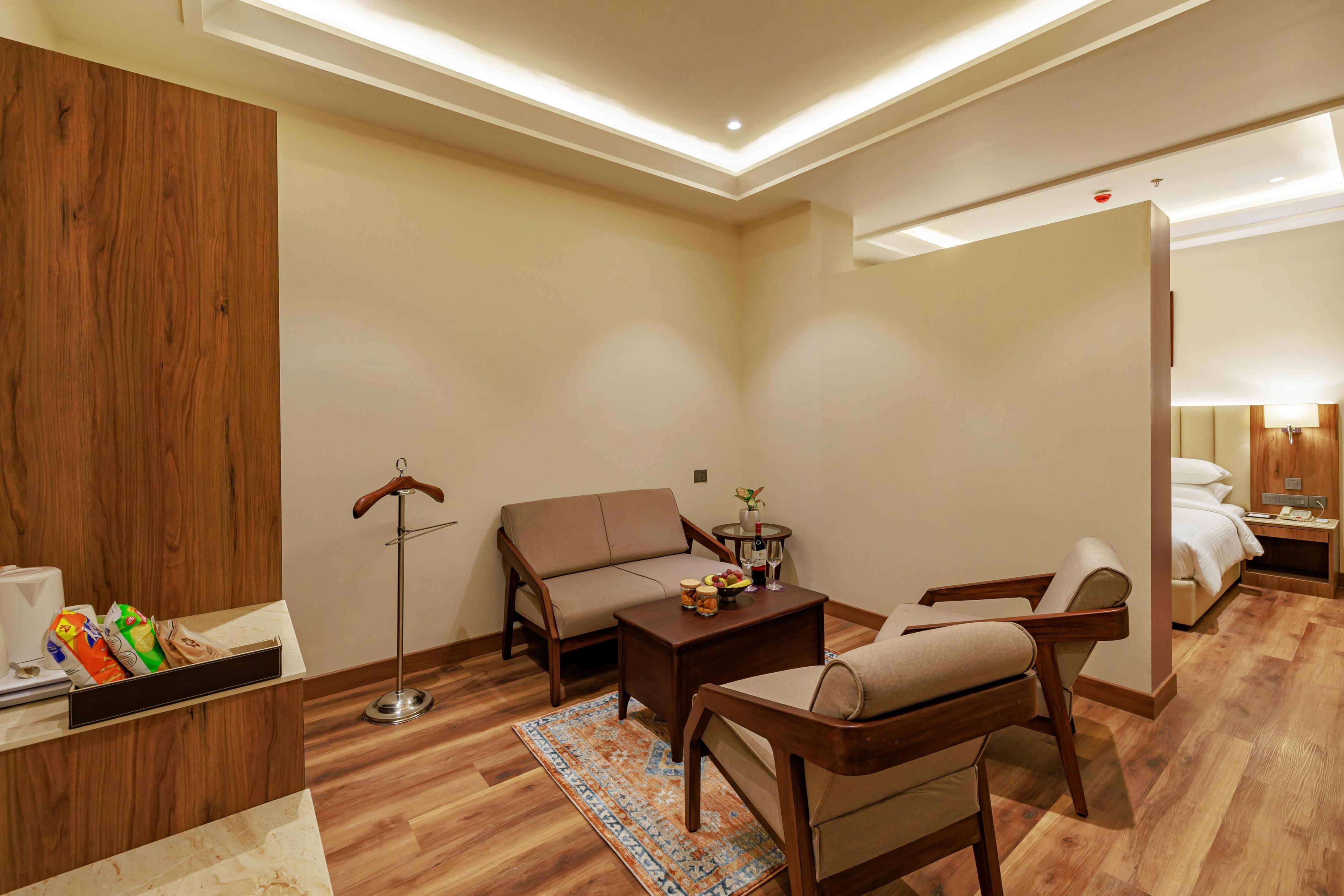 Regenta Place Jaipur Room Type - Suite Room - Enjoy Happy Hour 1+1 Mocktail timing 11 AM to 7 PM