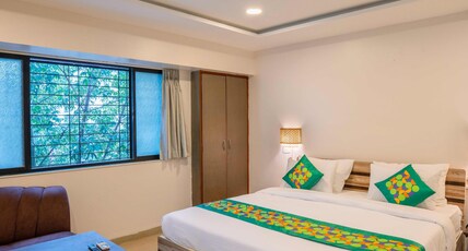 Treebo Royal Comfort Atithi Room Type - Premium Room