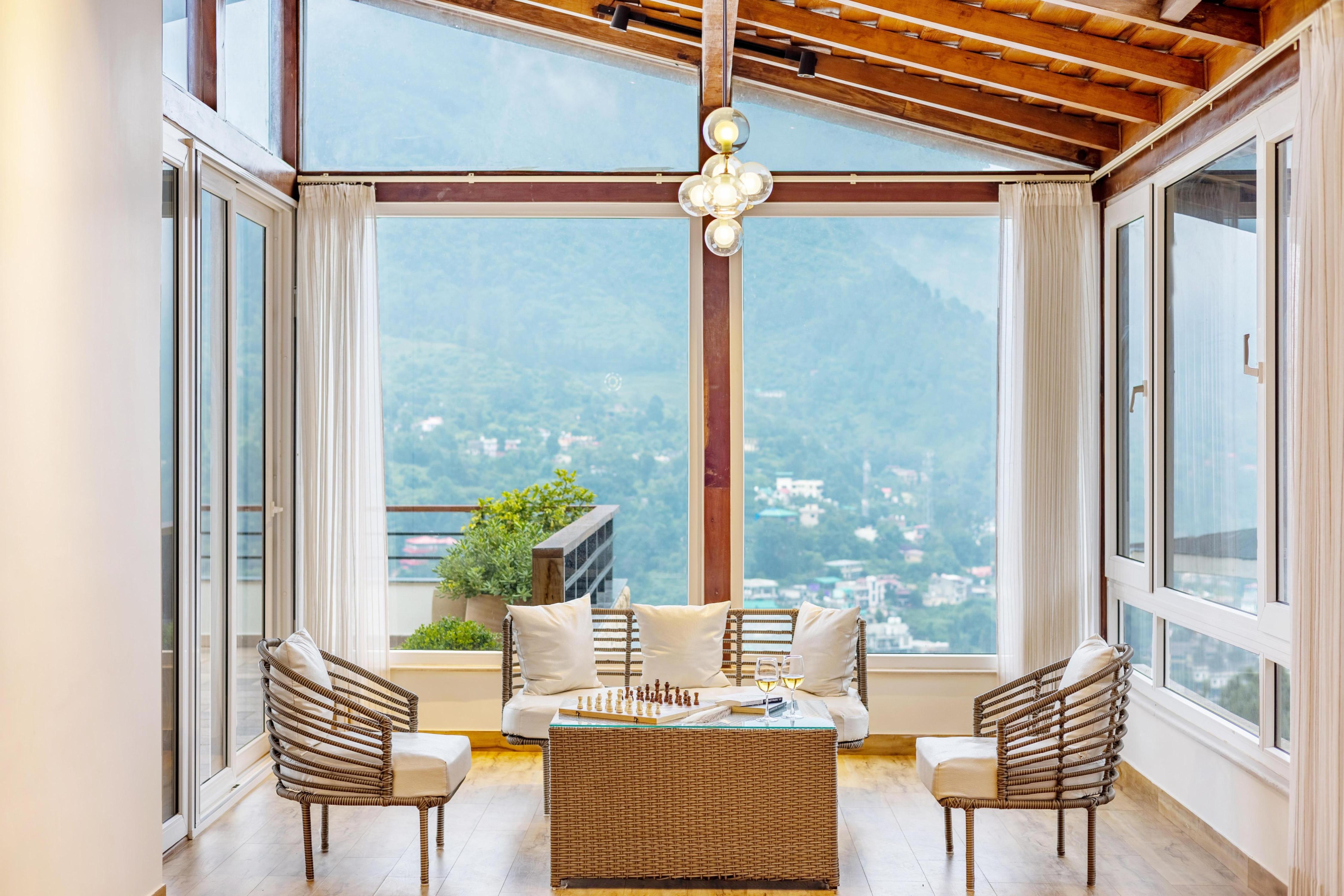 ELIVAAS Signature 2 BHK with Terrace & Lake View | Antarmann Casa Ember - Tap to explore photos