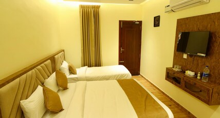 SUTHANTHIRA STAY INN Room Type - Deluxe Triple Room AC