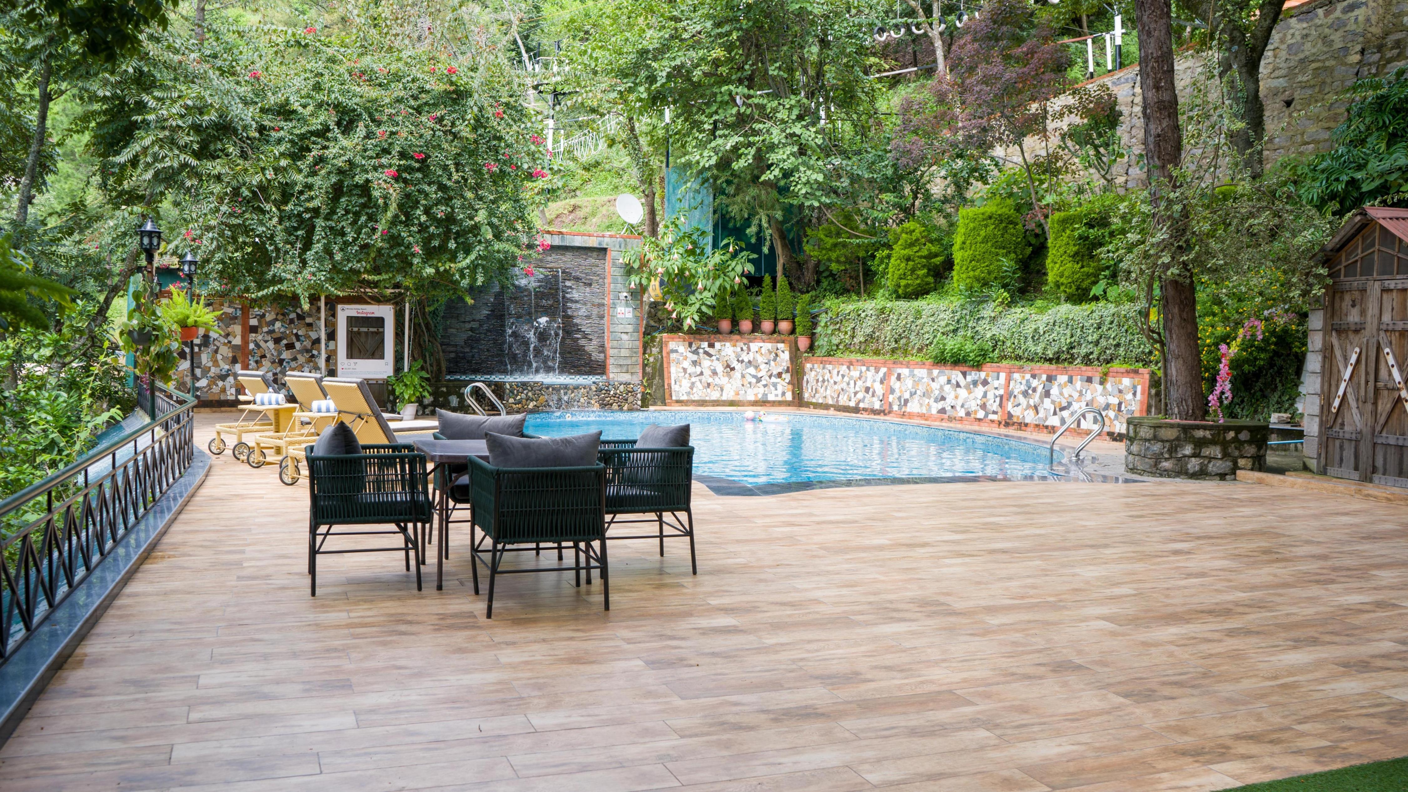ELIVAAS 3 BHK with pool & Gaming Room | Alpine Nook - Tap to explore photos