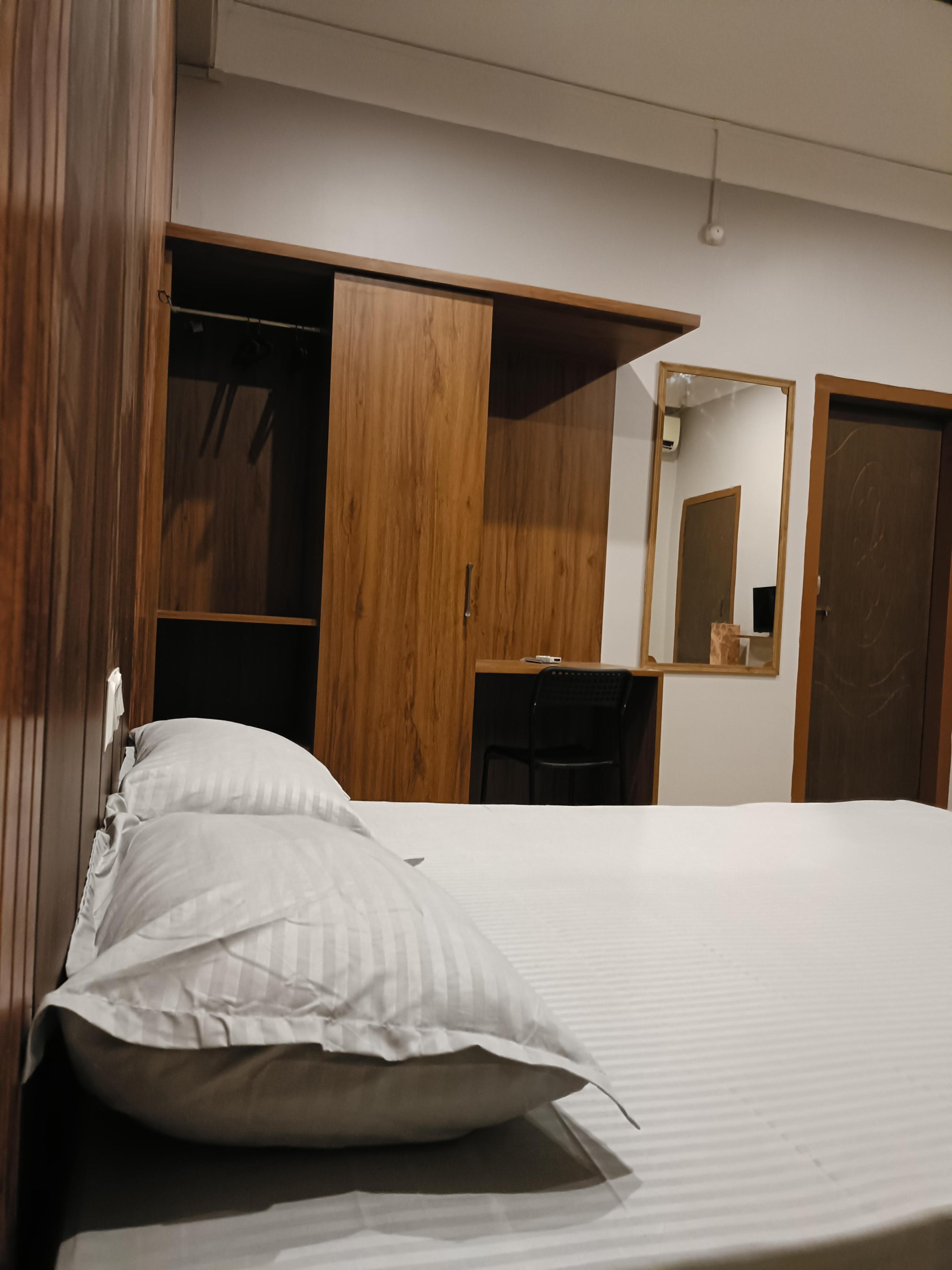 Twin Bed Room with attached Bath - Tap to explore photos