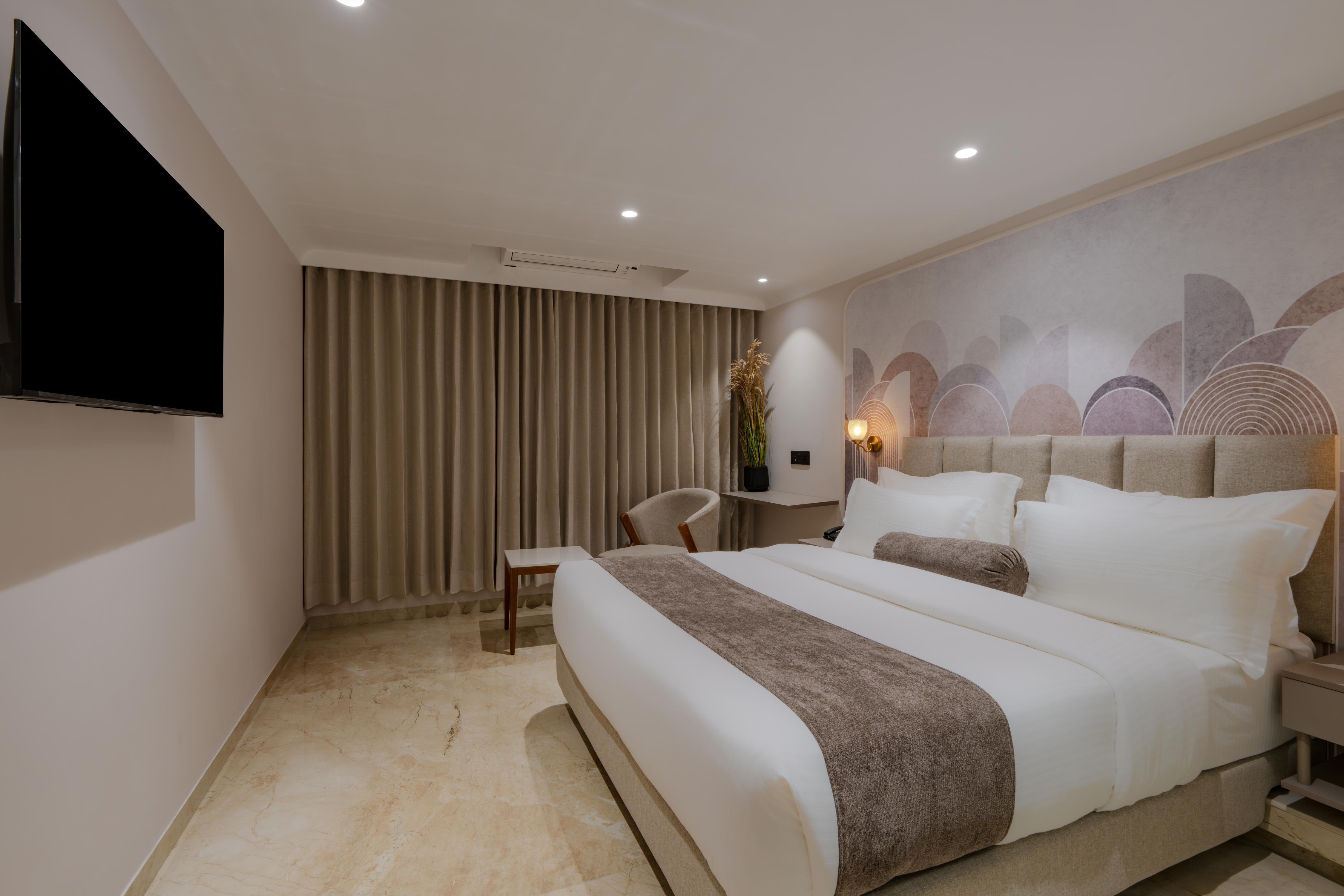 Hotel The Grand Suites - Tap to explore photos