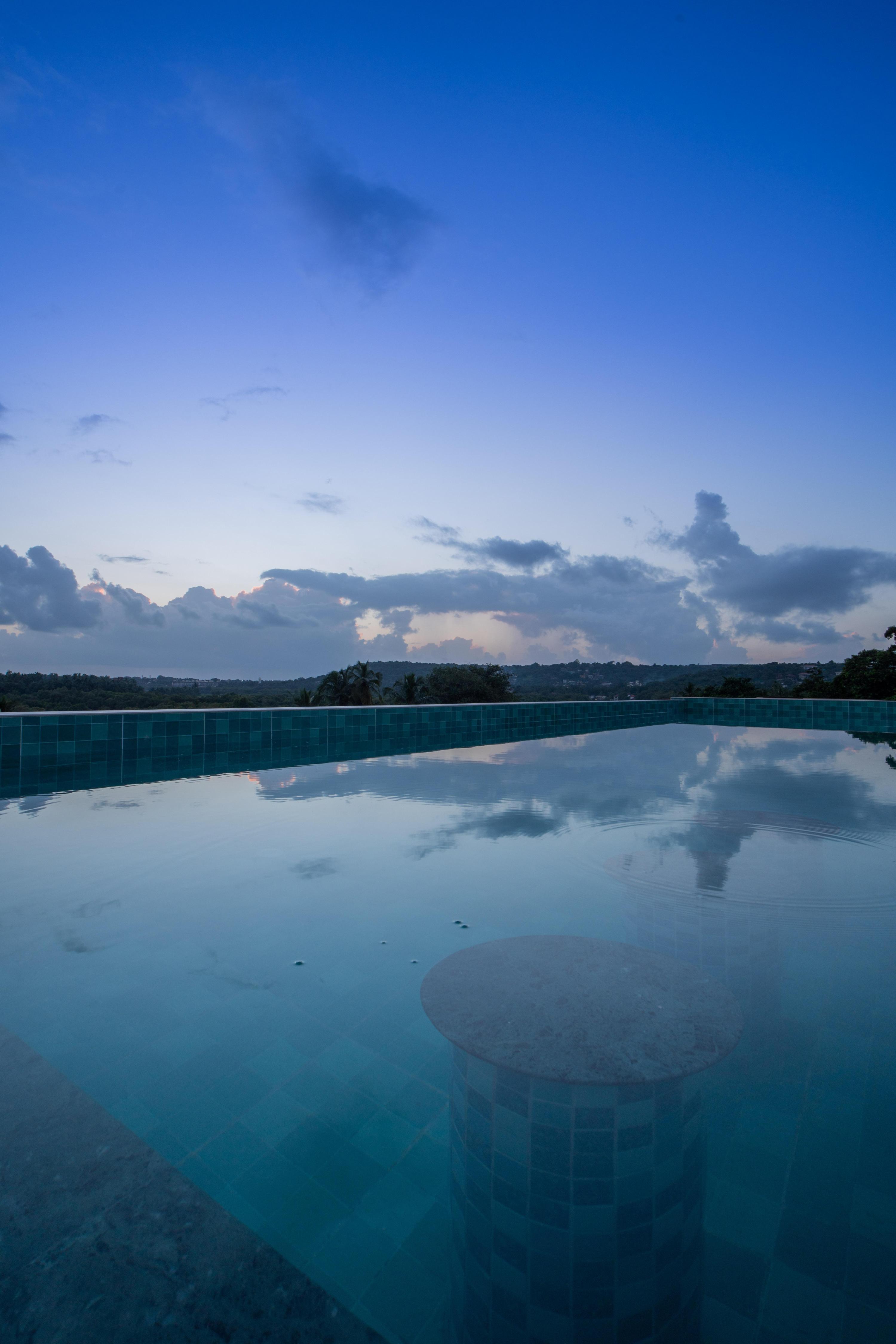 ELIVAAS Signature 1 BHK with Rooftop Pool | Kamerios Verano - Tap to explore photos