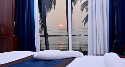 Sun & Sand Luxury Stays Sea View Room Type - Ac Deluxe Room (First floor sea-facing balcony) Sun & Sand Luxury Stays Sea View Room Type - Ac Deluxe Room (First floor sea-facing balcony)