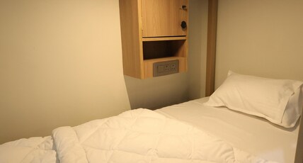 Shri Gurudev Luxurious | AC Dormitory Room Type - Female Dormitory Bed