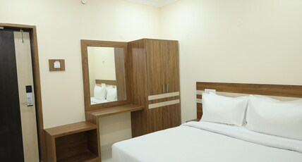 Vasantham Inn Room Type - Deluxe Double Bed Room