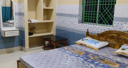Pravashini Nivas Room Type - Bedroom 102