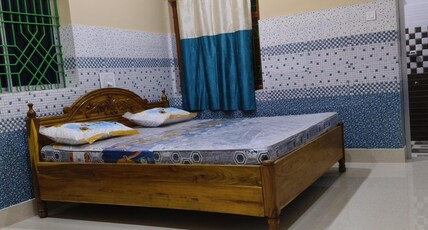 Pravashini Nivas Room Type - Bedroom 103