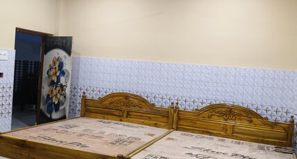 Pravashini Nivas Room Type - Bedroom 105