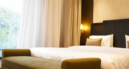 PRIMELAND HOTEL Room Type - Deluxe Room