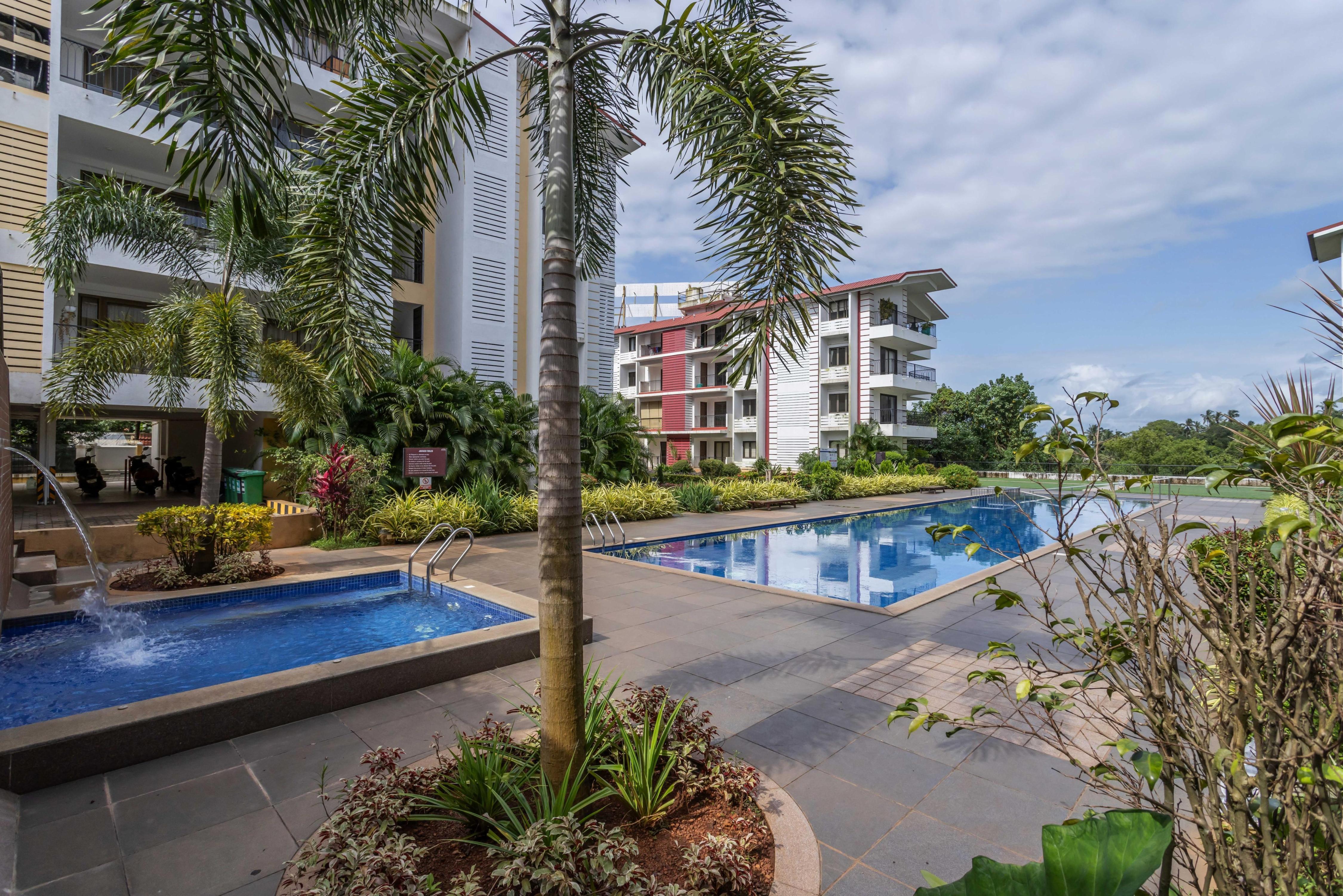 Acron Sea Winds By Hireavilla - 1BHK w Pool & Sauna | 2km to Calangute & Baga Beach - Tap to explore photos