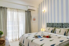 1BHK w Sauna & Common Pool, Less than 2km to Beach | Hireavilla