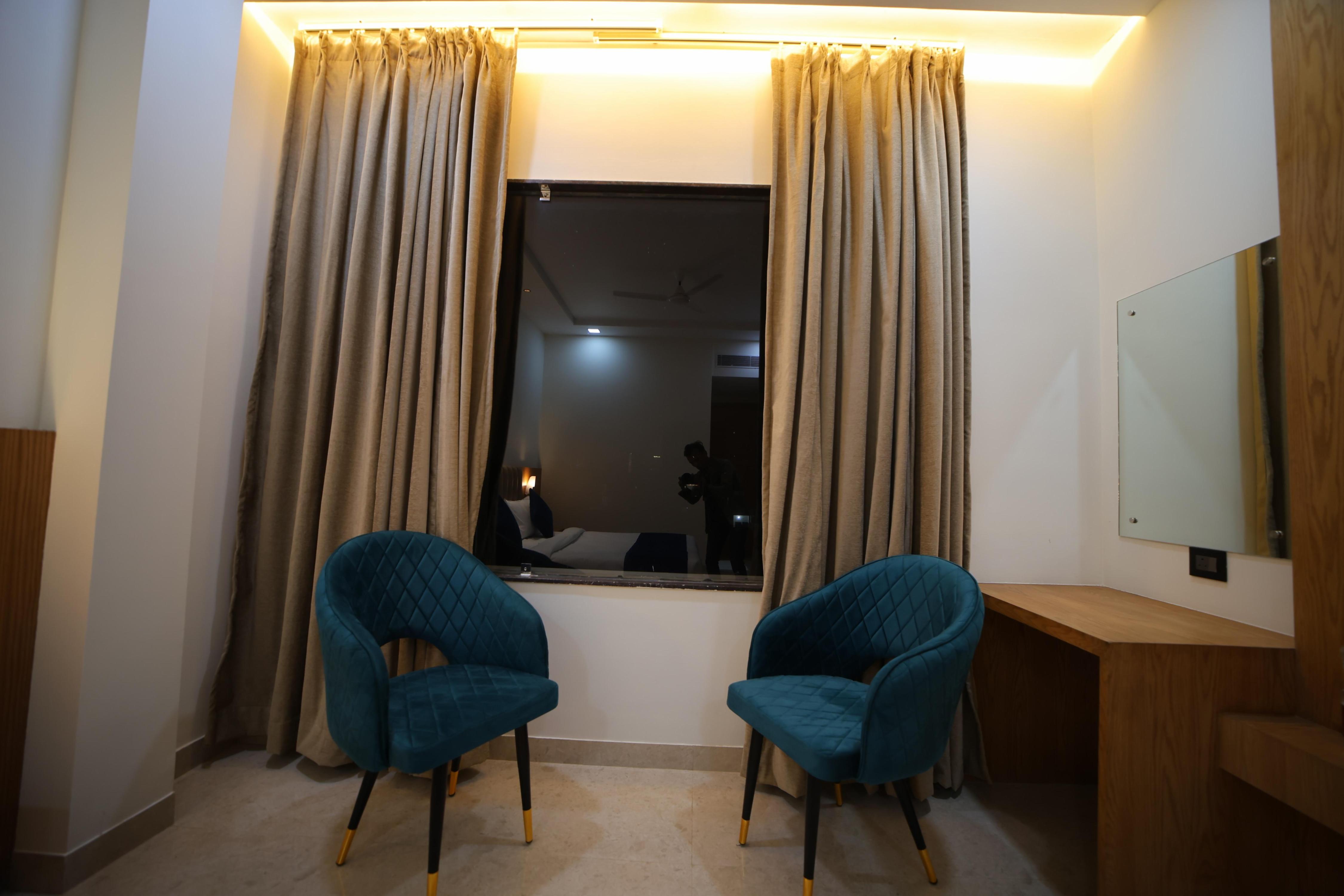 Hotel Rs Vista by Dominent Hotels - Tap to explore photos
