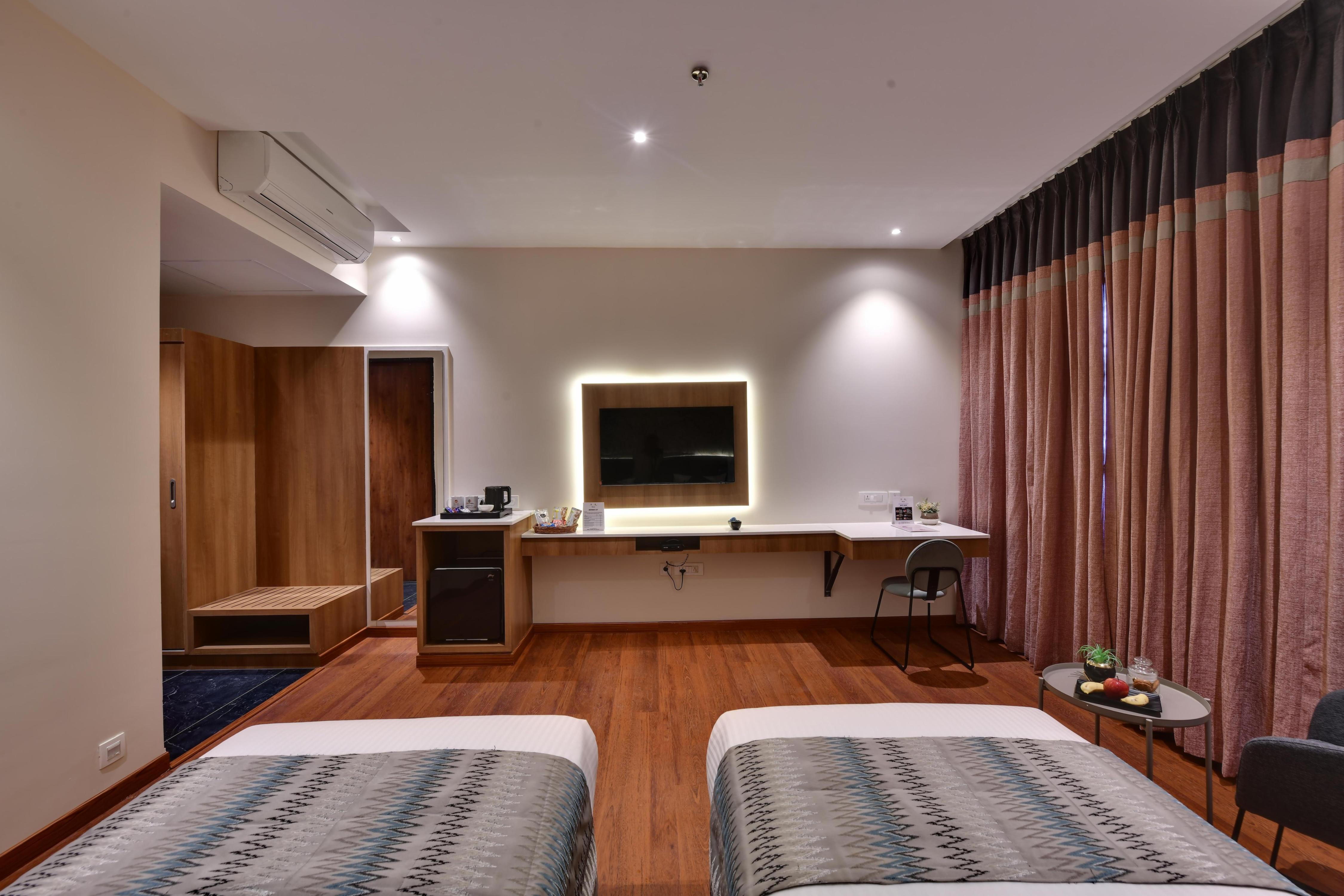 Click Hotel Vista - Kempegowda Airport - Tap to explore photos