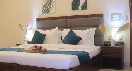 Pink Guava near 32nd Avenue Room Type - Deluxe Room
