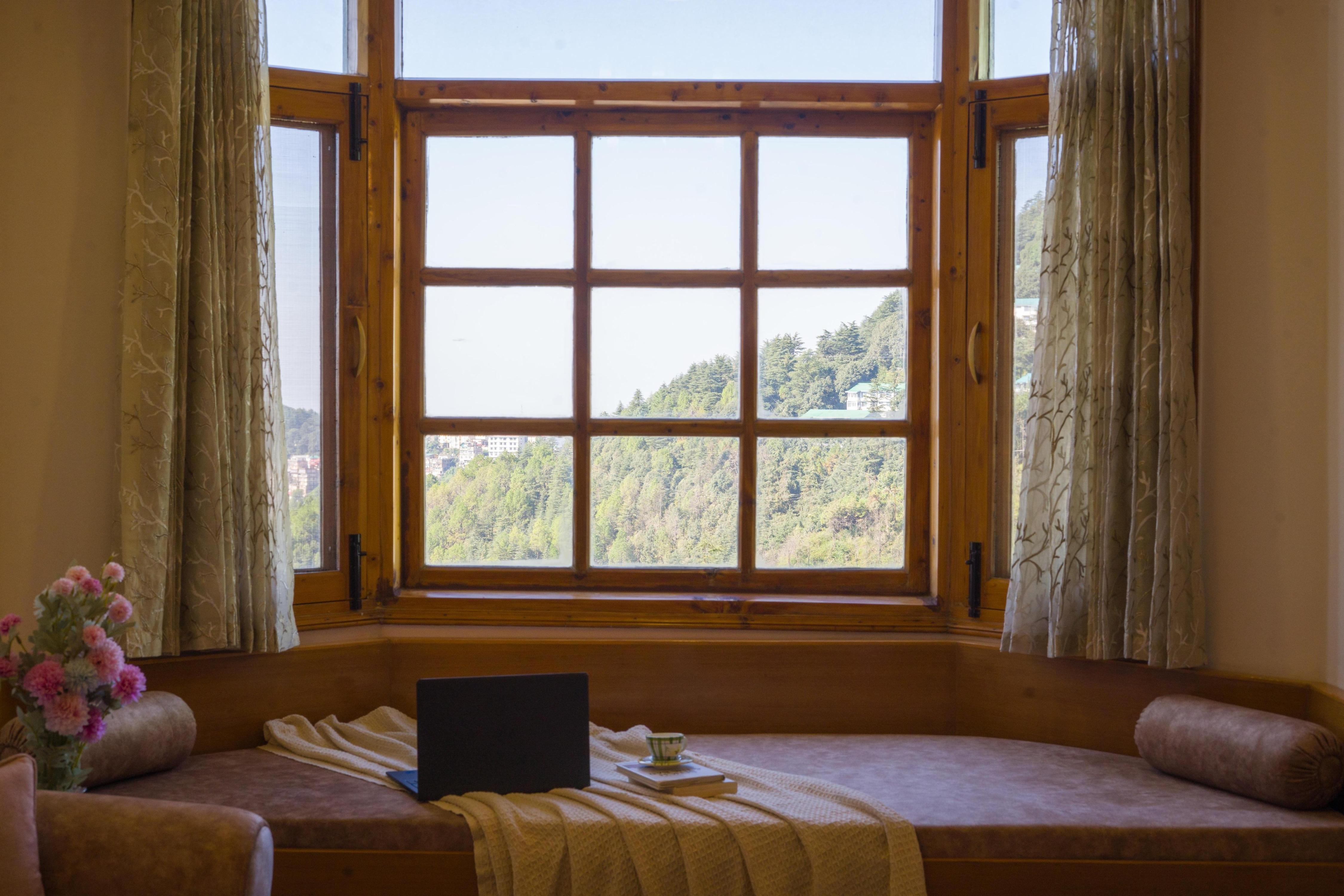 ELIVAAS 4 BHK with Hills View & Restaurant | Hemkunj Blossom - Tap to explore photos