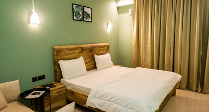Skystay Elite Suites | Omaxe Hazratganj Room Type - Olive Luxe Apartment
