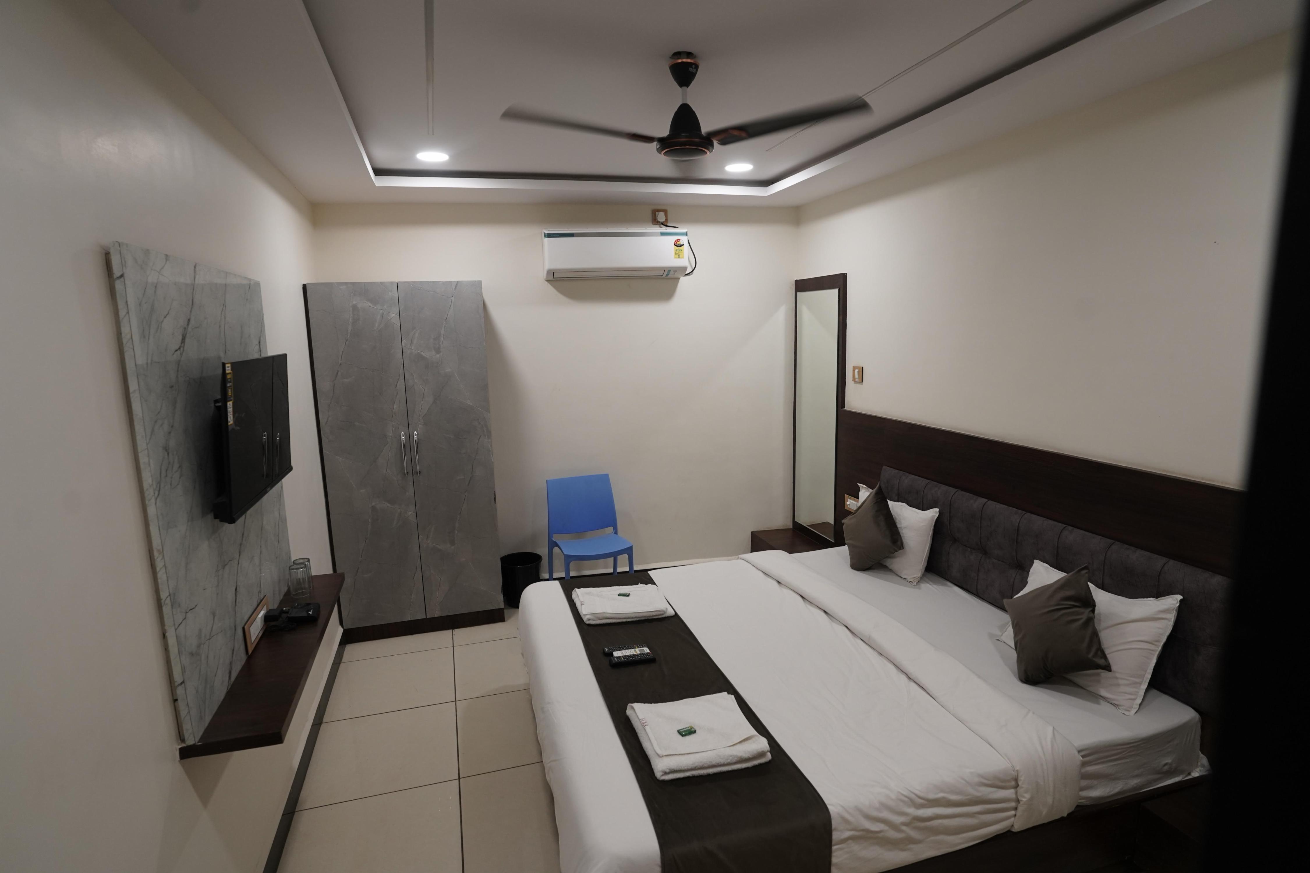 Hotel Dev Kripa - Tap to explore photos