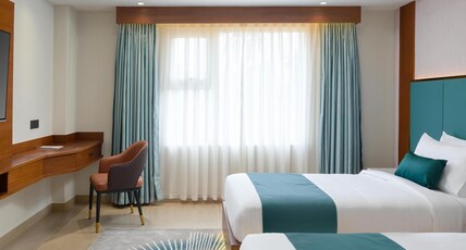 Kowju Airport Hotel Calicut Room Type - Premium Twin Kowju Airport Hotel Calicut Room Type - Premium Twin