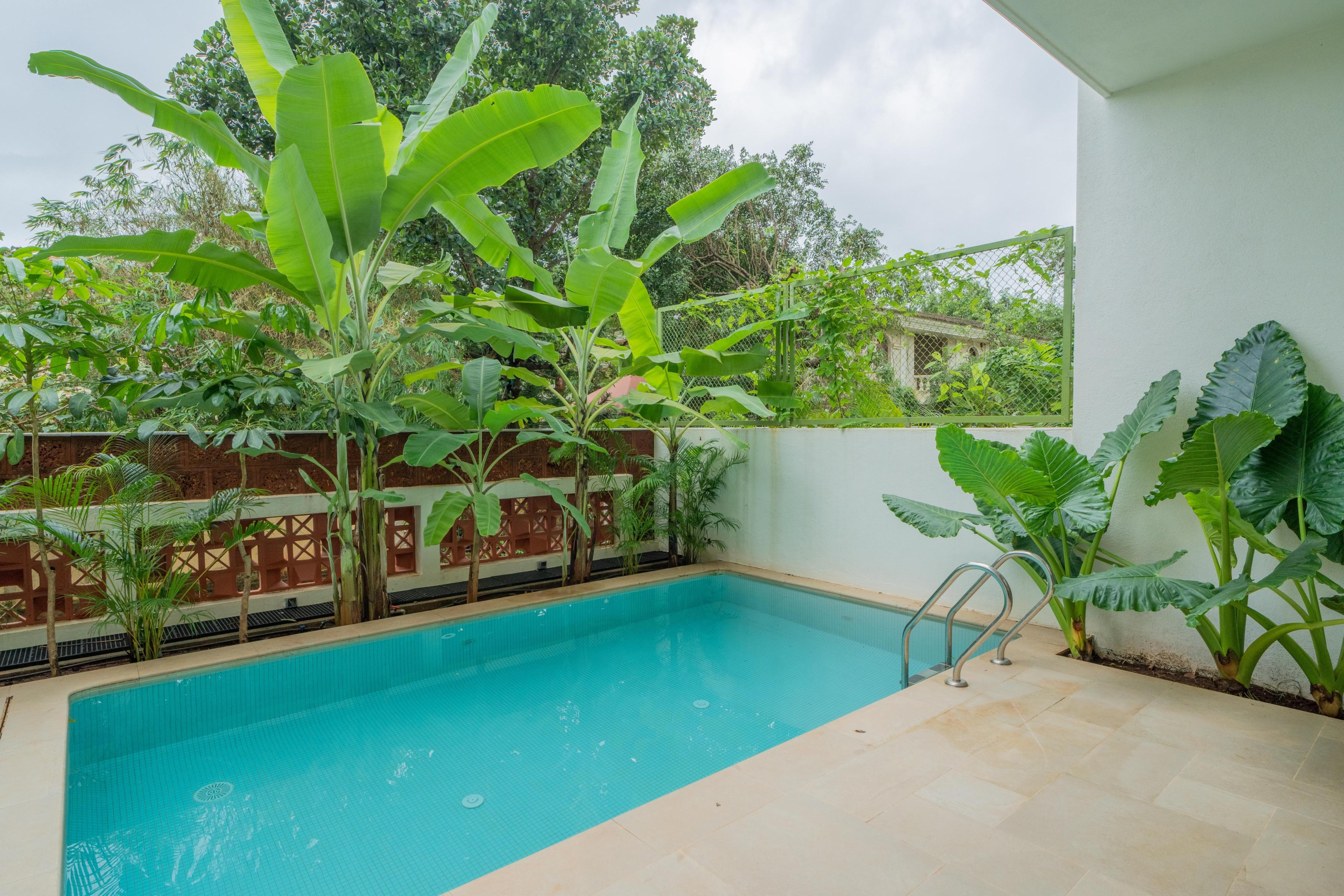 Elegant 3 BHK Villa Outdoor Pool - Tap to explore photos