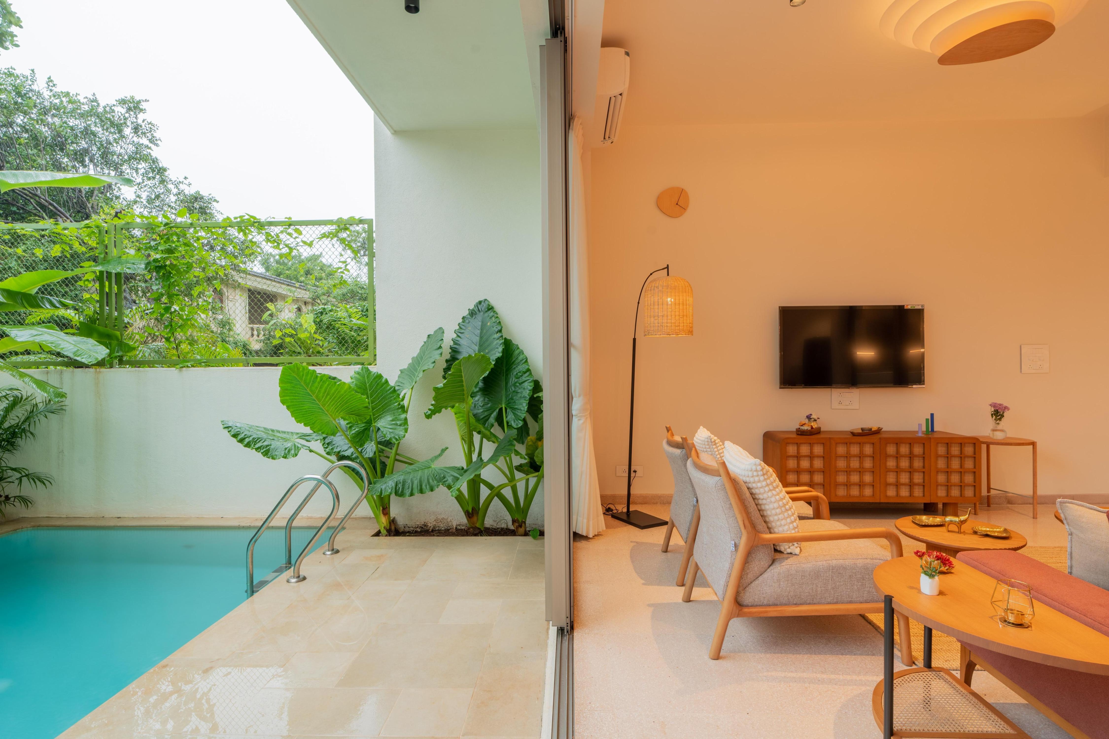 Elegant 3 BHK Villa Outdoor Pool - Tap to explore photos