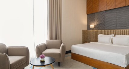 Clarks Inn Etawah Room Type - Suite AC room with Living area and King Bed Clarks Inn Etawah Room Type - Suite AC room with Living area and King Bed