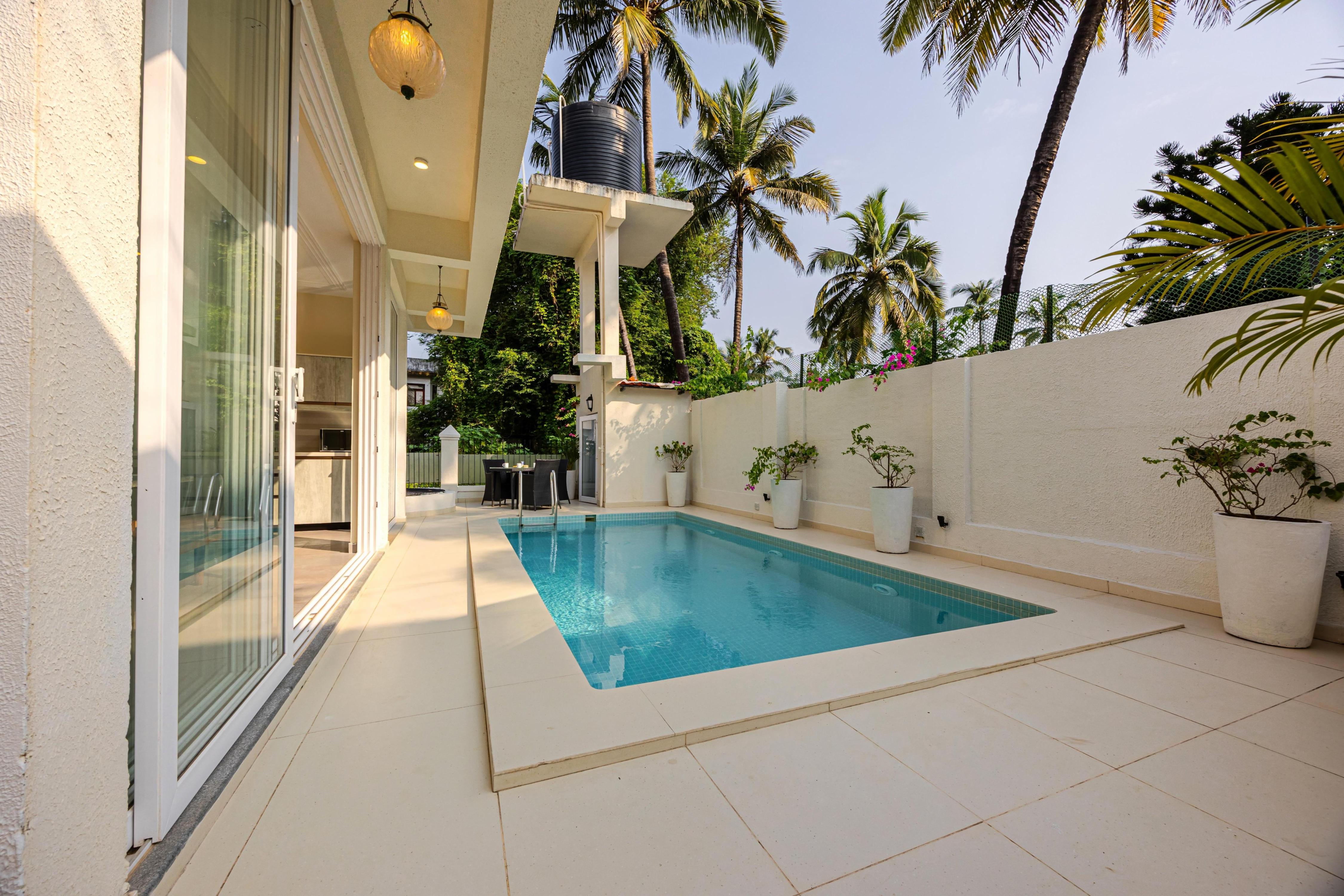 Luxurious 4 BHK Villa with Pool & Terrace - Tap to explore photos