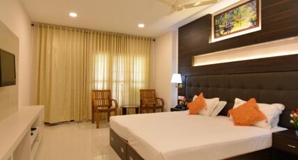 Hotel Green Palace Room Type - AC DELUXE ROOM WITH GARDEN VIEW