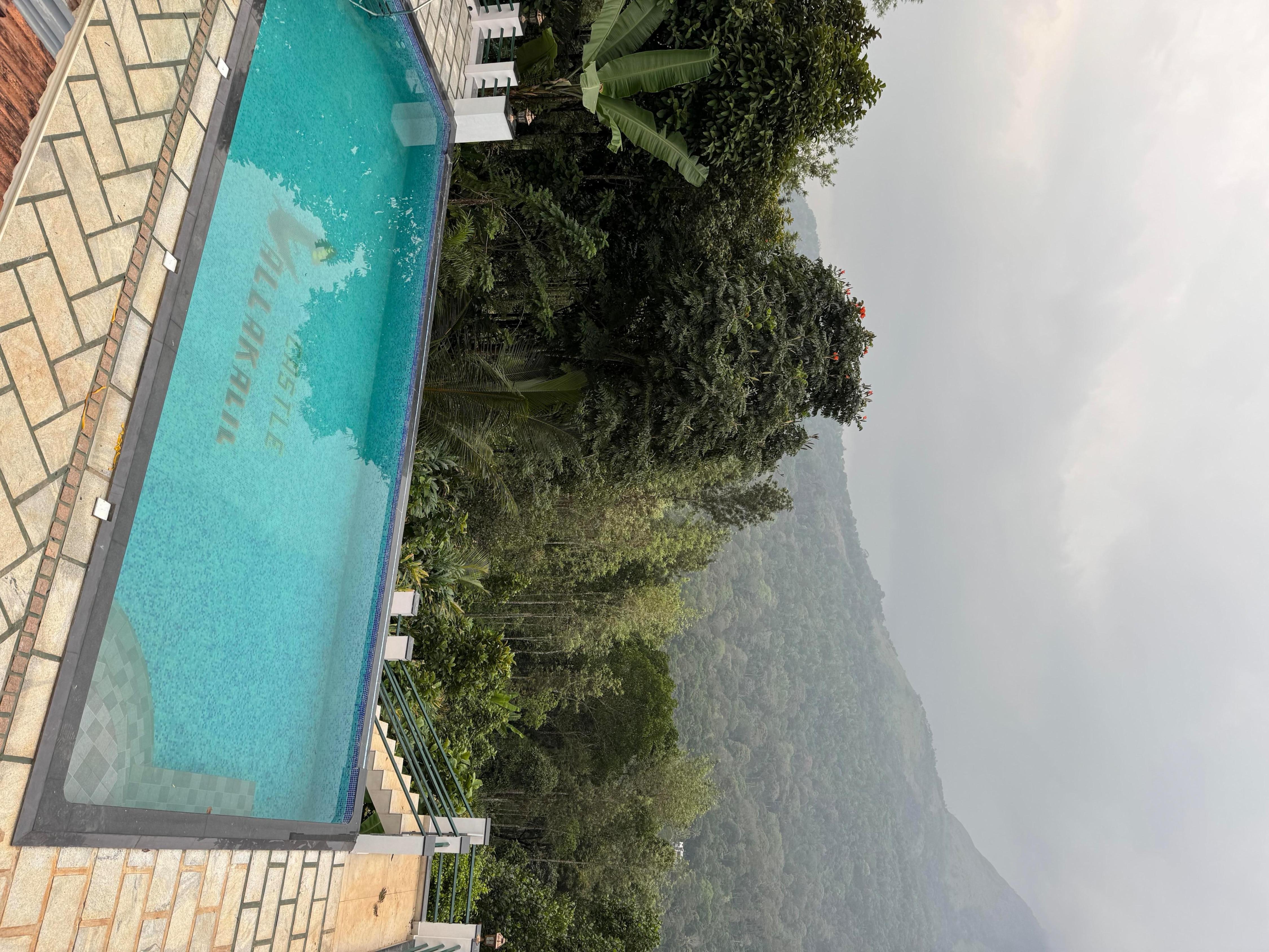 The Castle Vallakkalil Homestay Munnar - Tap to explore photos