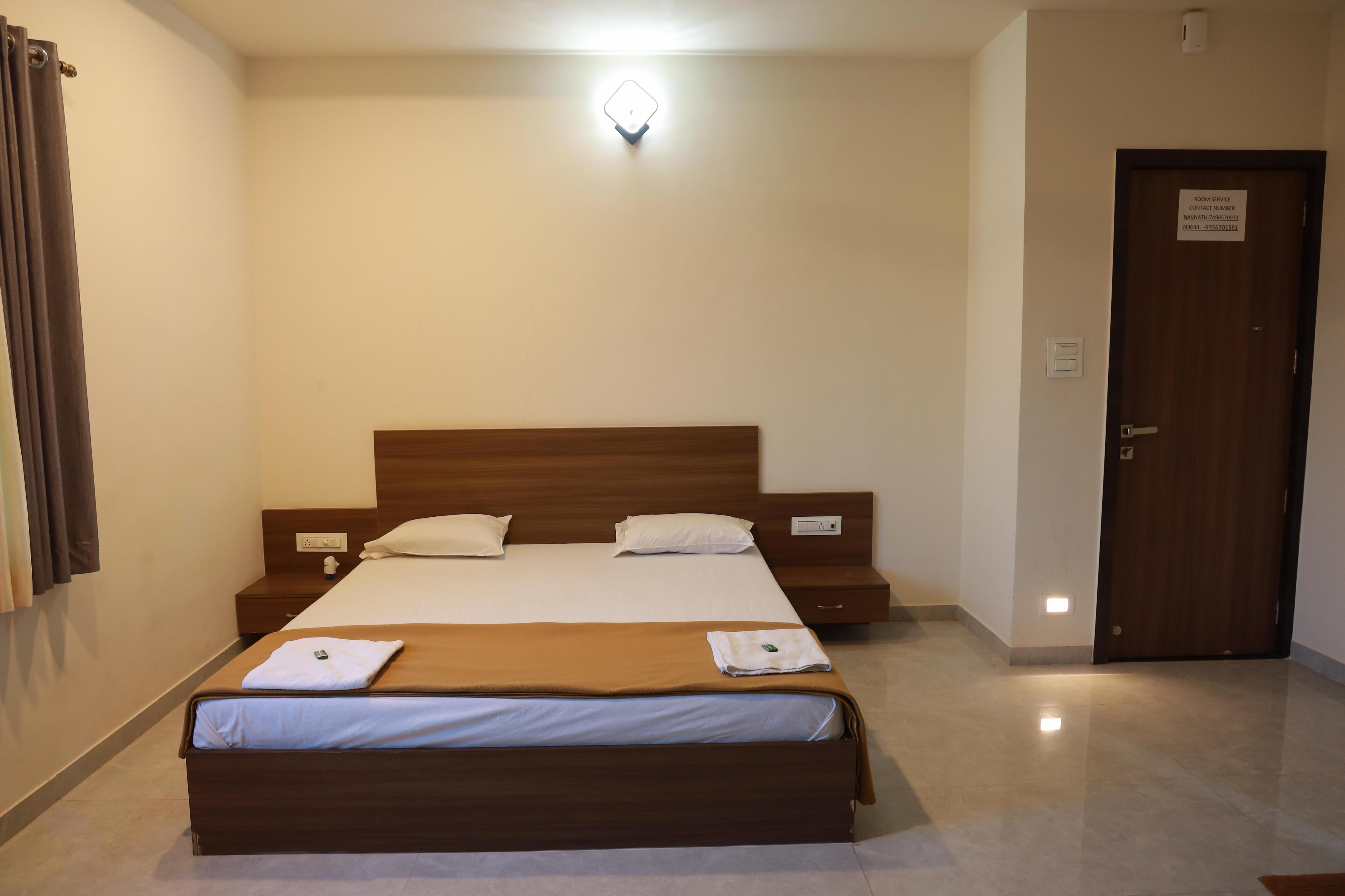 HOTEL NATRAJ AND LODGING Room Type - Deluxe Room