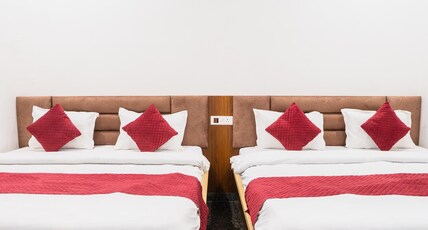 Hotel Shyam Sanwara (Free Gated Parking Available) Room Type - Family Room ( 2 Double Bed | 4 Pax )