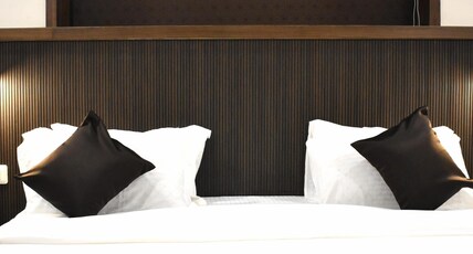 Pincode 90 Executive Suites Room Type - Deluxe Room