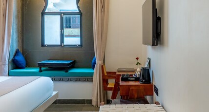 Madri Retreat - Heritage Boutique Hotel with Pool Room Type - Deluxe Queen Room: Complimentary pick-up from Chandpole Parking,prior intimation required. Madri Retreat - Heritage Boutique Hotel with Pool Room Type - Deluxe Queen Room: Complimentary pick-up from Chandpole Parking,prior intimation required.