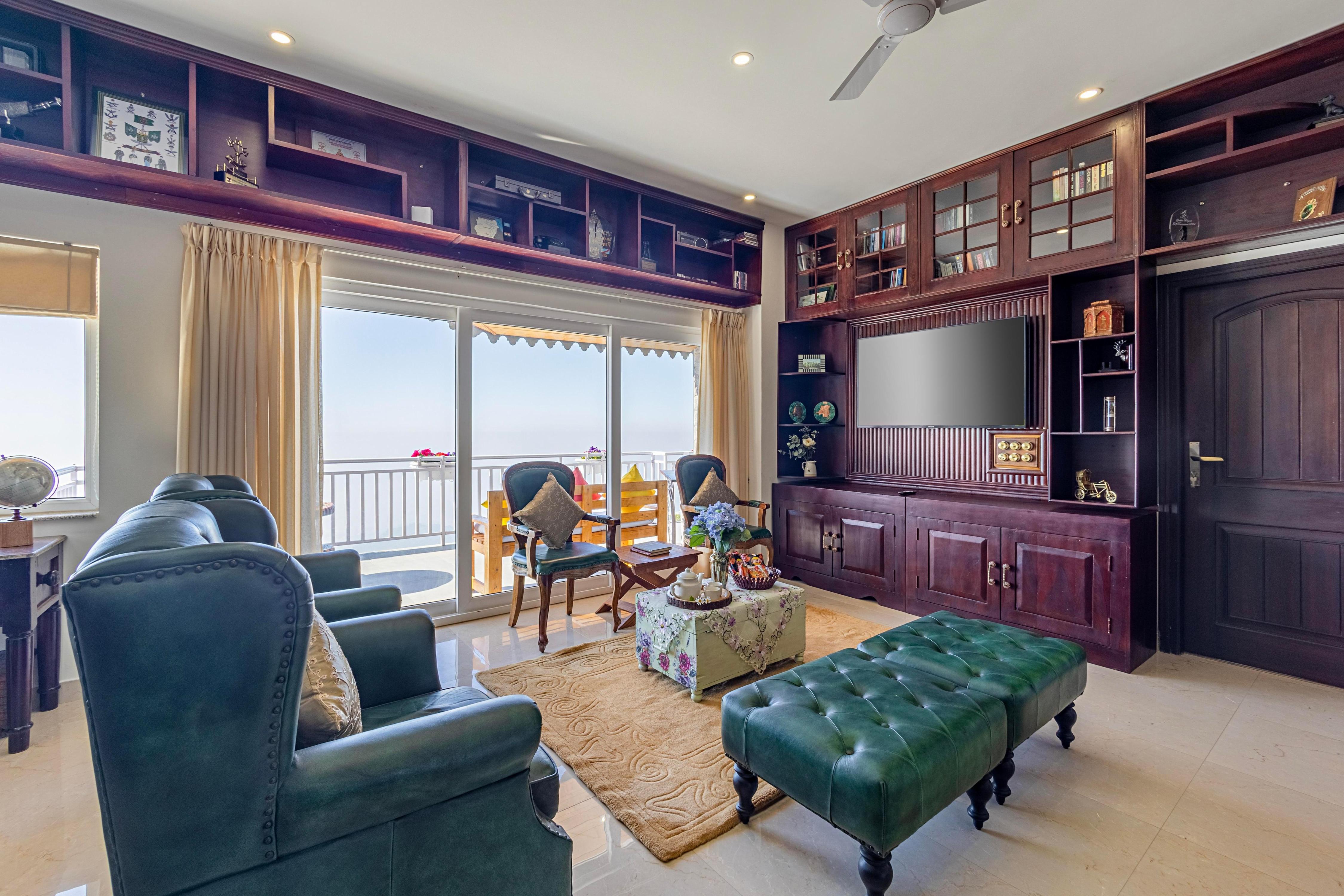 ELIVAAS Signature 4BHK with Attic Cliffside Villa with Scenic Views - Tap to explore photos