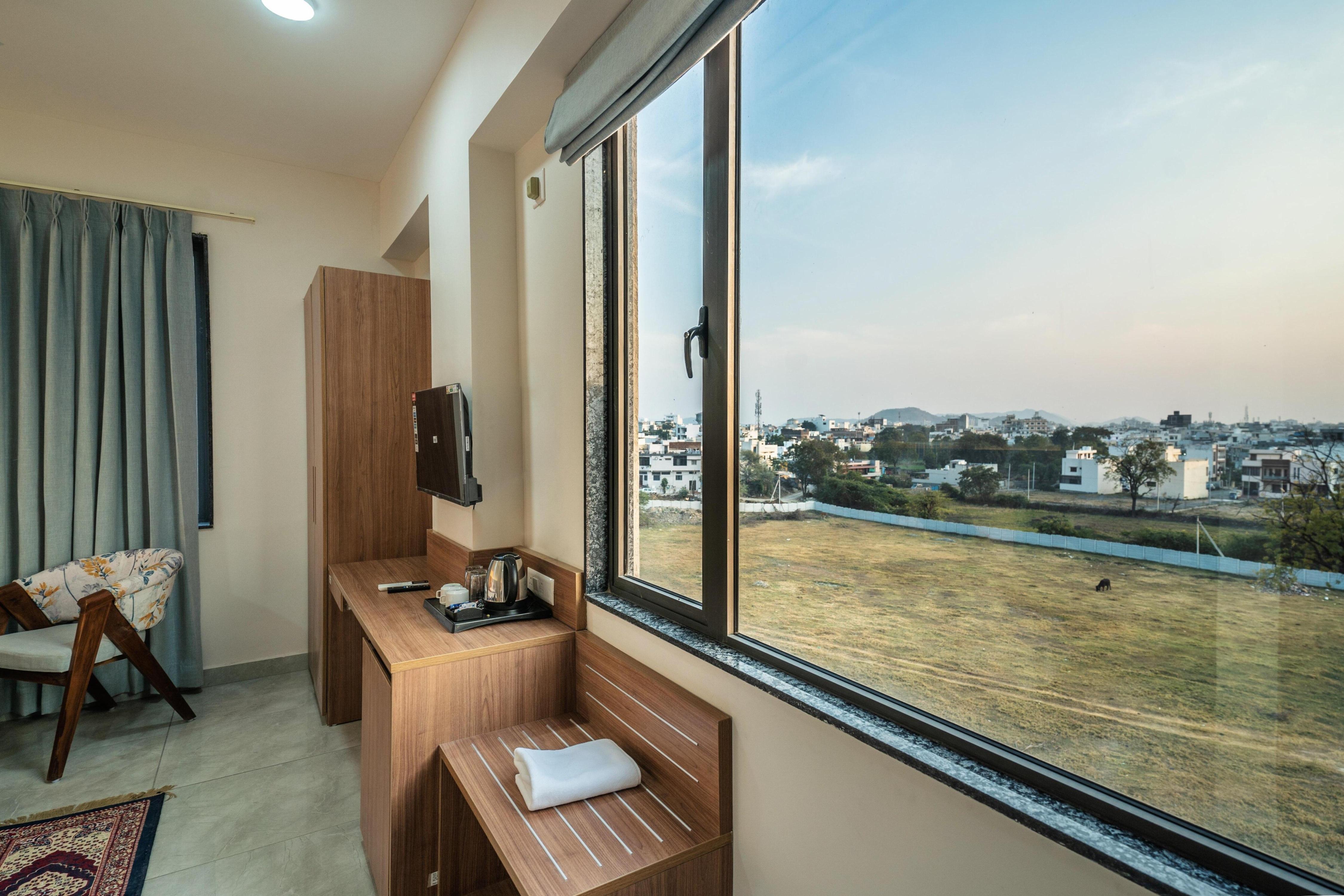 Hotel Patwar Inn With Rooftop Swimming Pool and Mountain Views - Tap to explore photos