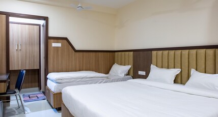 HOTEL PRM ARUNA ARCHADIA Room Type - Super Deluxe Triple