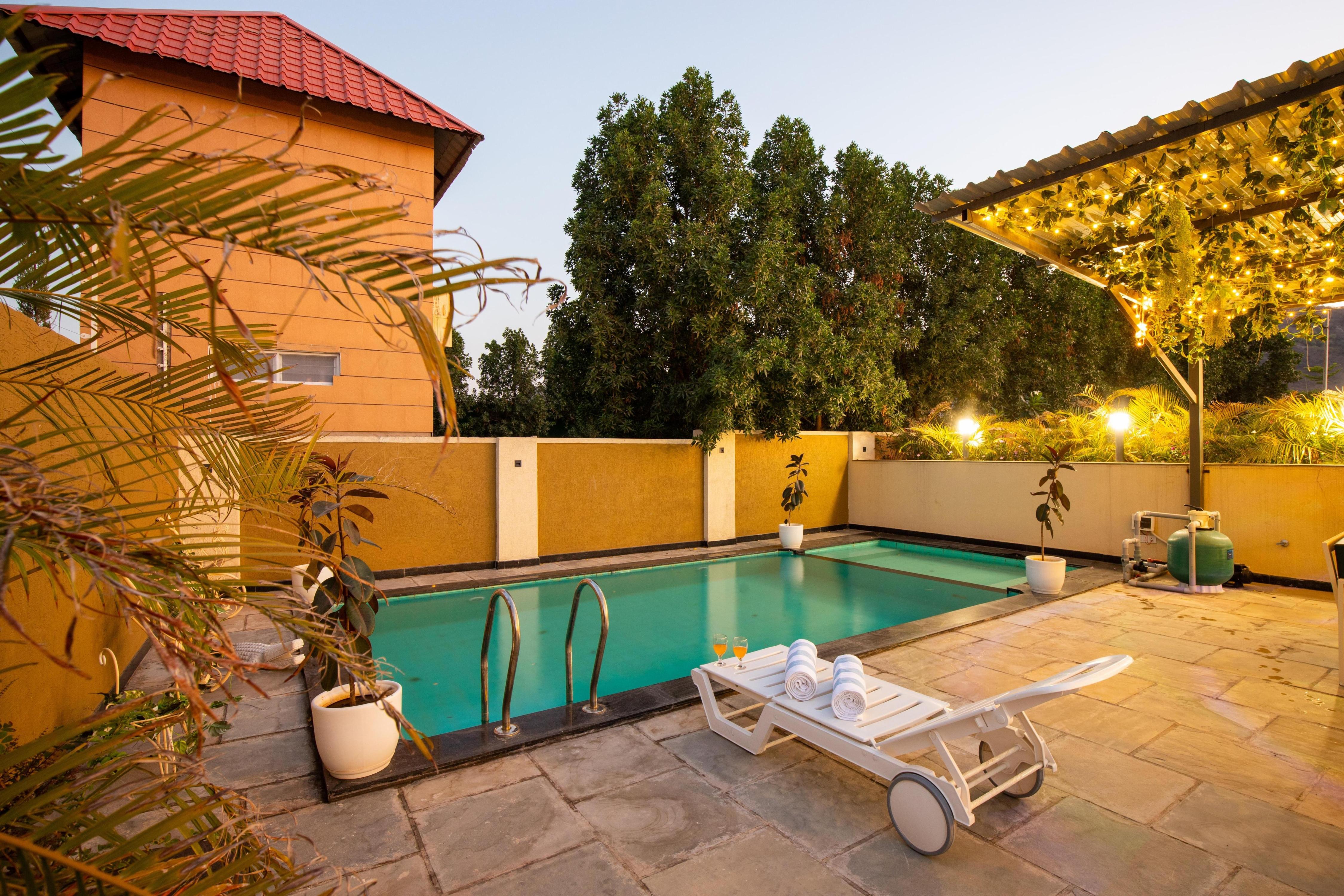 Exquisite 3 BHK Villa Retreat with Pool & Garden - Tap to explore photos