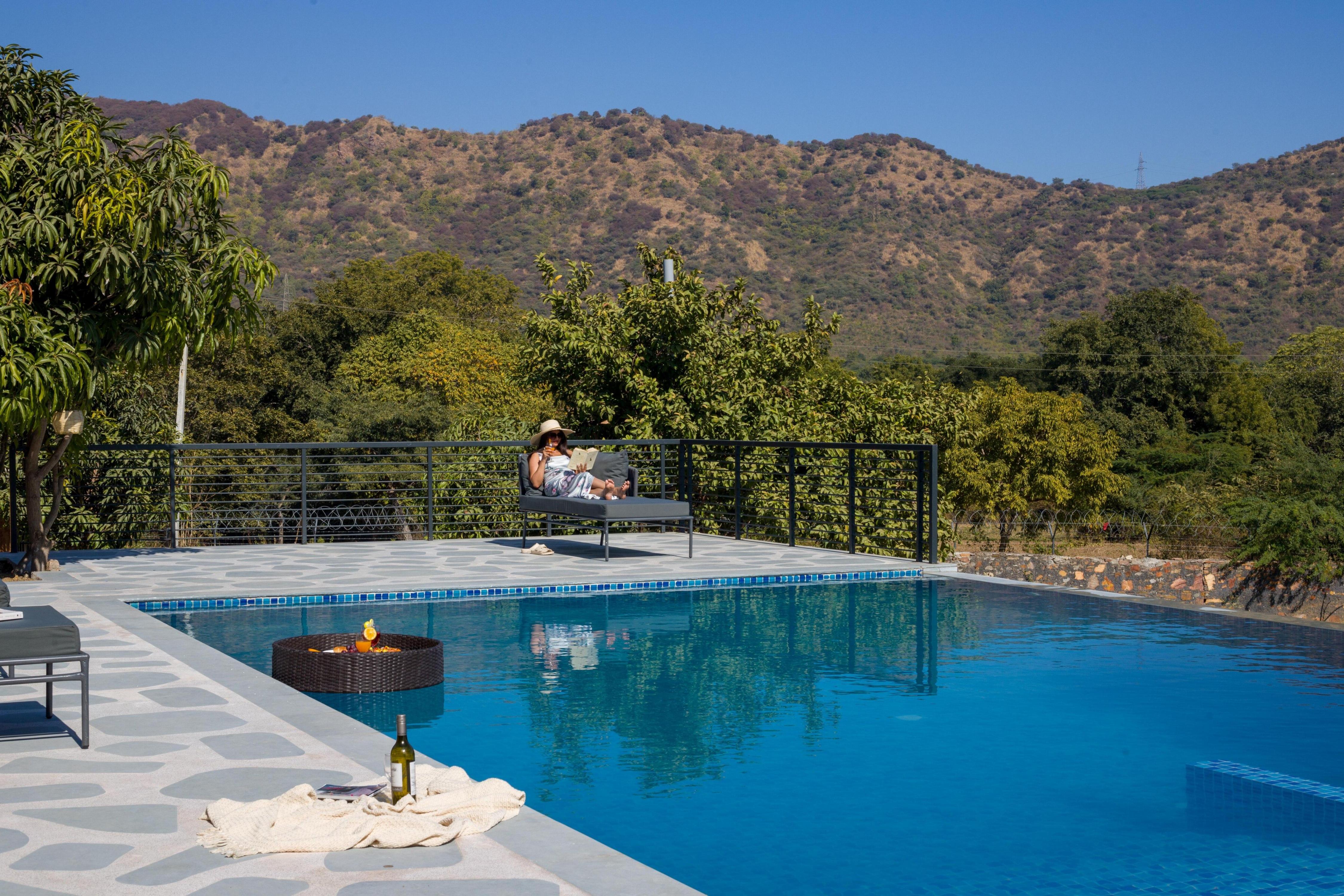 ELIVAAS Signature Cows and Cuddles Farmstay 4 BHK with Pvt Pool and Garden - Tap to explore photos