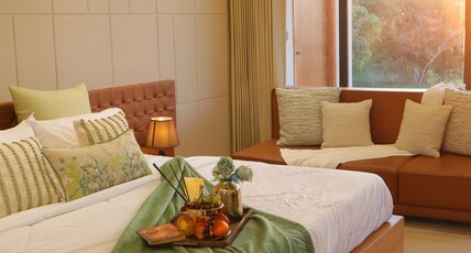The Lavish Greens Resorts Room Type - PREMIUM SUITE (Pool View And 2 Sided Glass View)