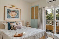 tisyastays | Wind Chimes 1BHK Apartment with Pool & Gym , Close to beach