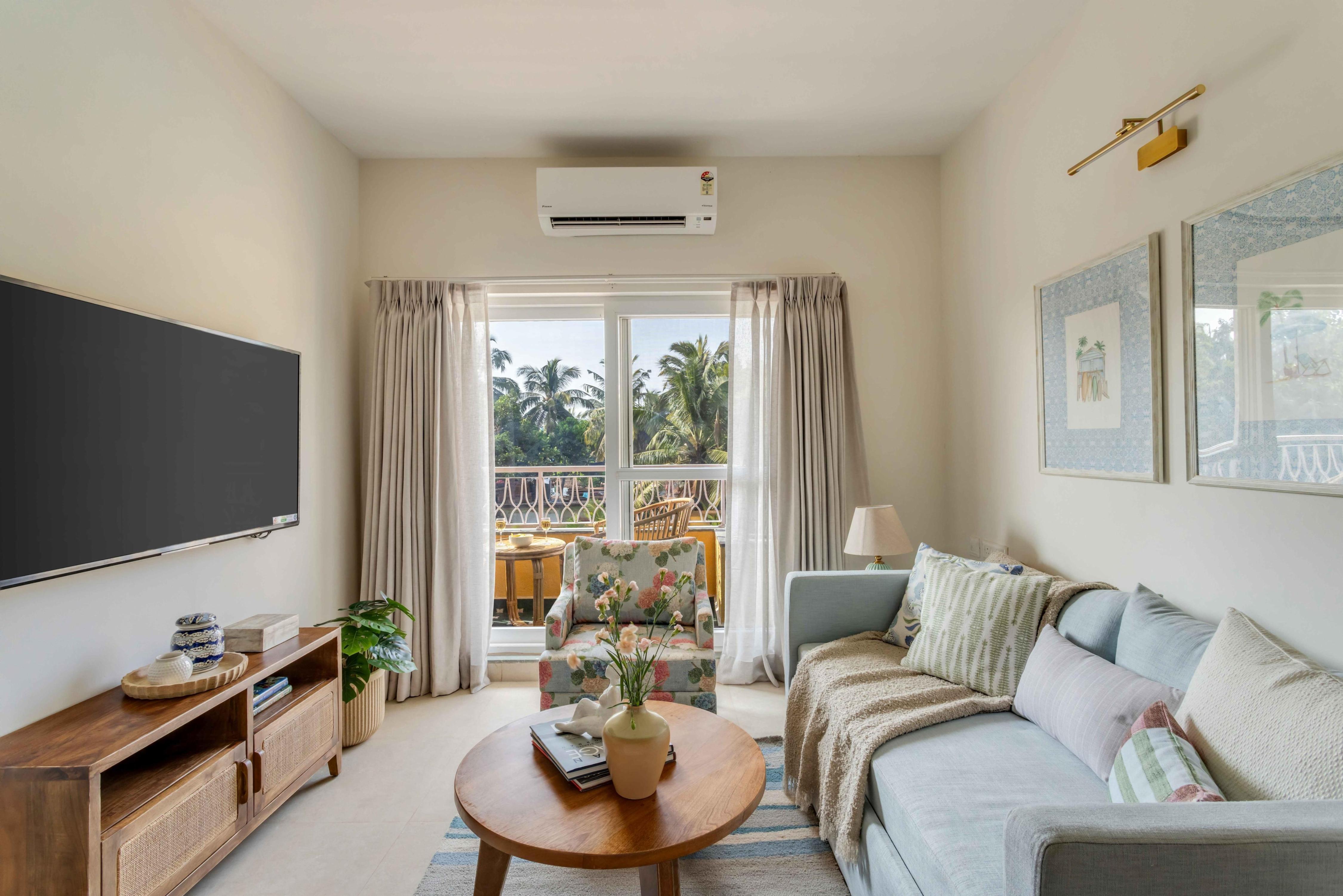 tisyastays | Wind Chimes 1BHK Apartment with Pool & Gym , Close to beach - Tap to explore photos