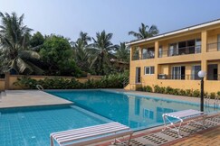 tisyastays | Casa de Viva 1BHK Apartment with Pool & Gym , Close to beach
