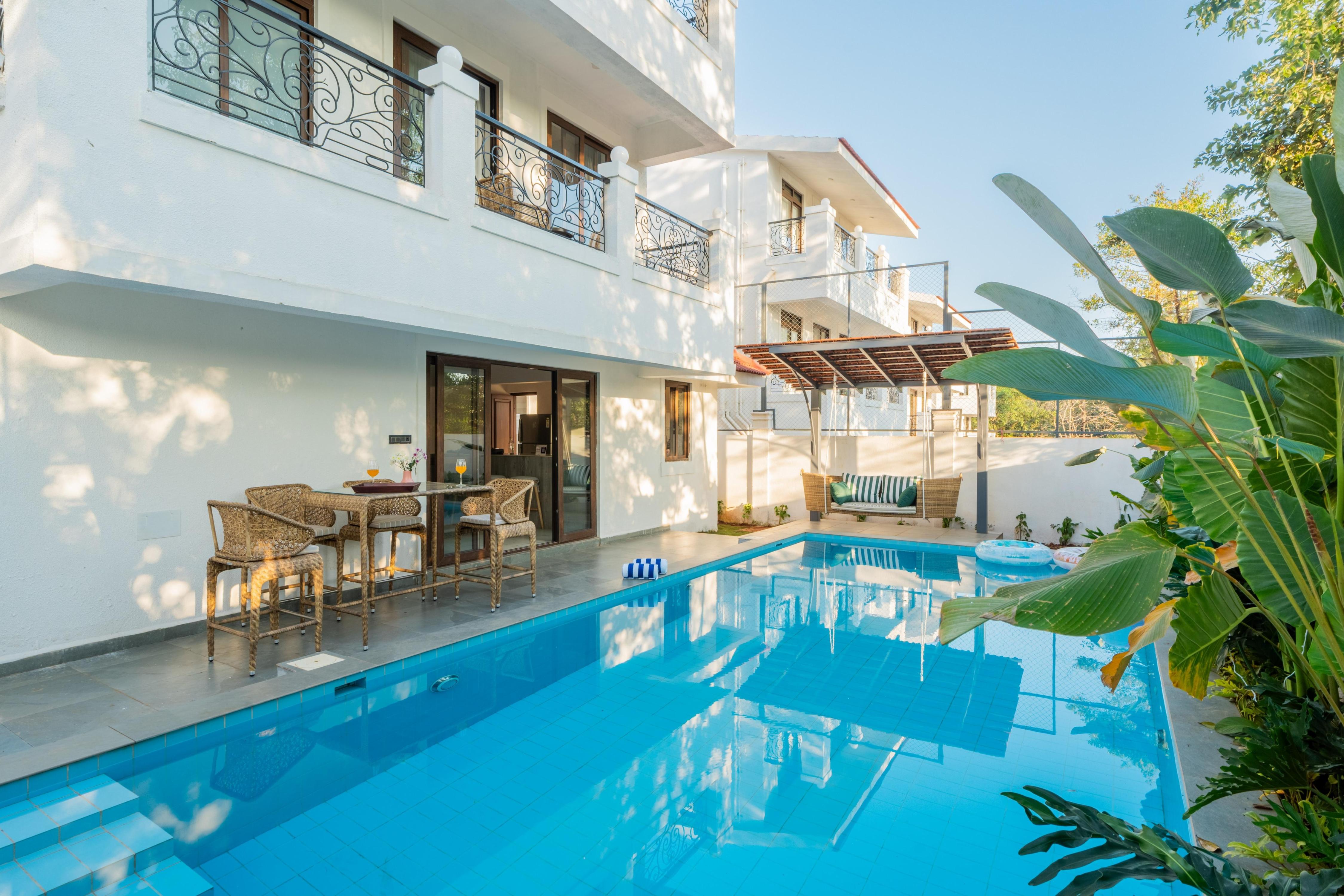 ELIVAAS Signature Villa Paraiso 4 BHK with Pool & Bar - Tap to explore photos
