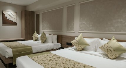 Biznotel by Pride Surat Room Type - Superior Family Room With City View