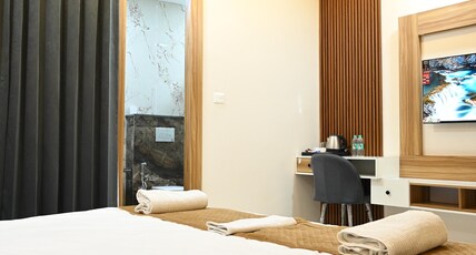 The Janki Hotel Room Type - Deluxe Room