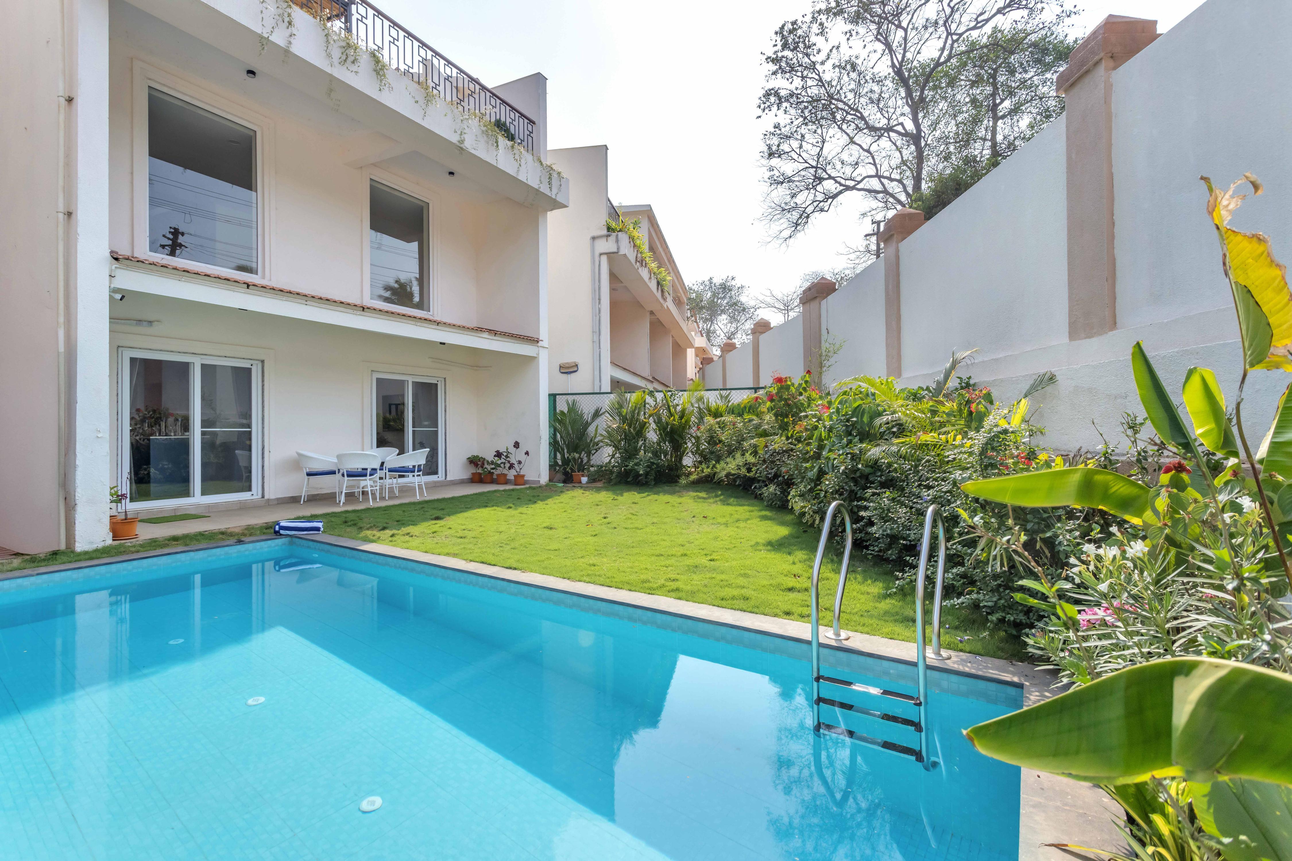 Spectacular Spaces |Bella Vista - Elegant 3BHK Pvt Pool ,Spacious Lawn & Outdoor Sitting Area|siolim - Tap to explore photos