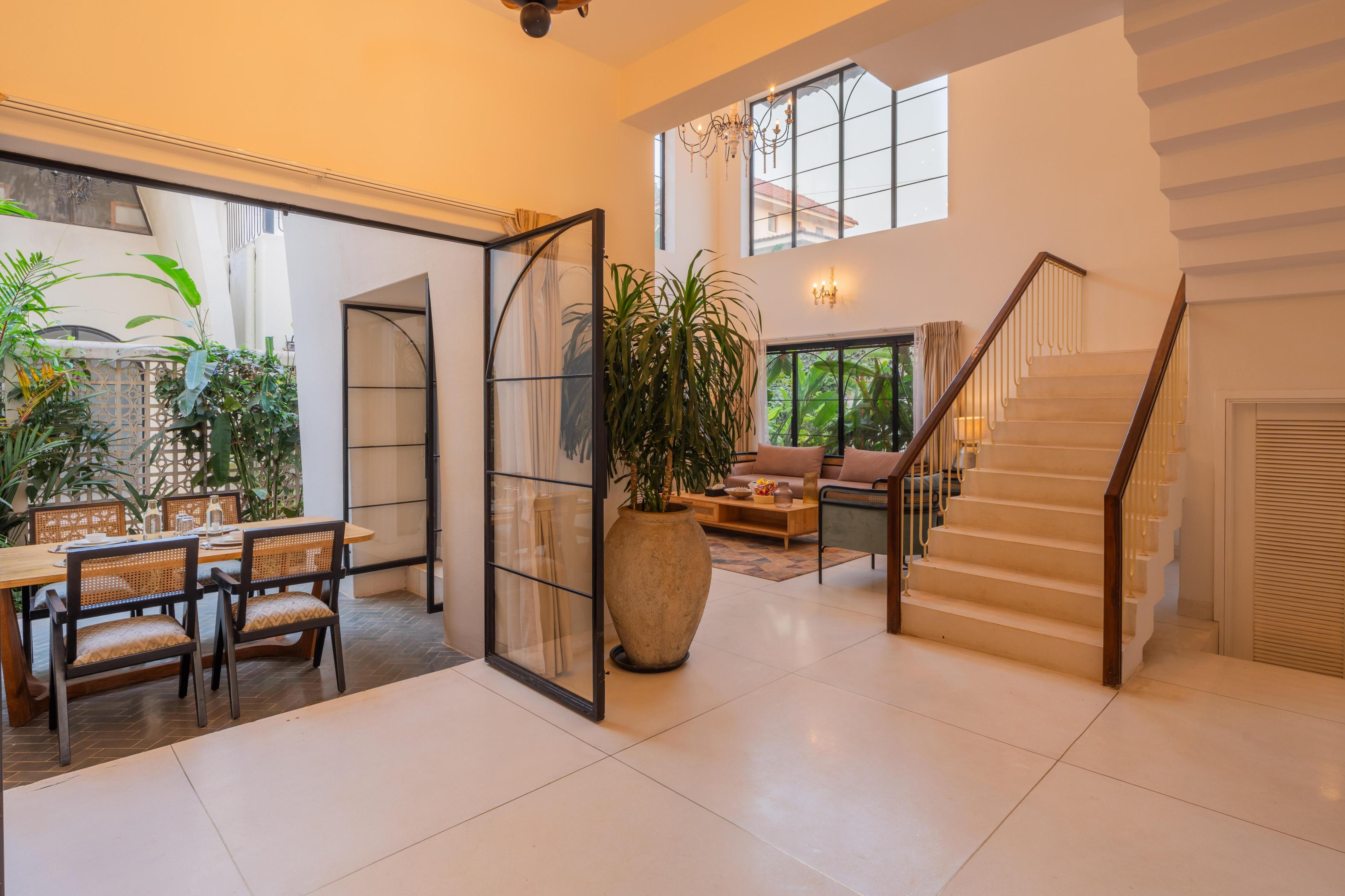 ELIVAAS Signature Bogenvilla Luxe 3 BHK Villa Near Ozran Beach - Tap to explore photos