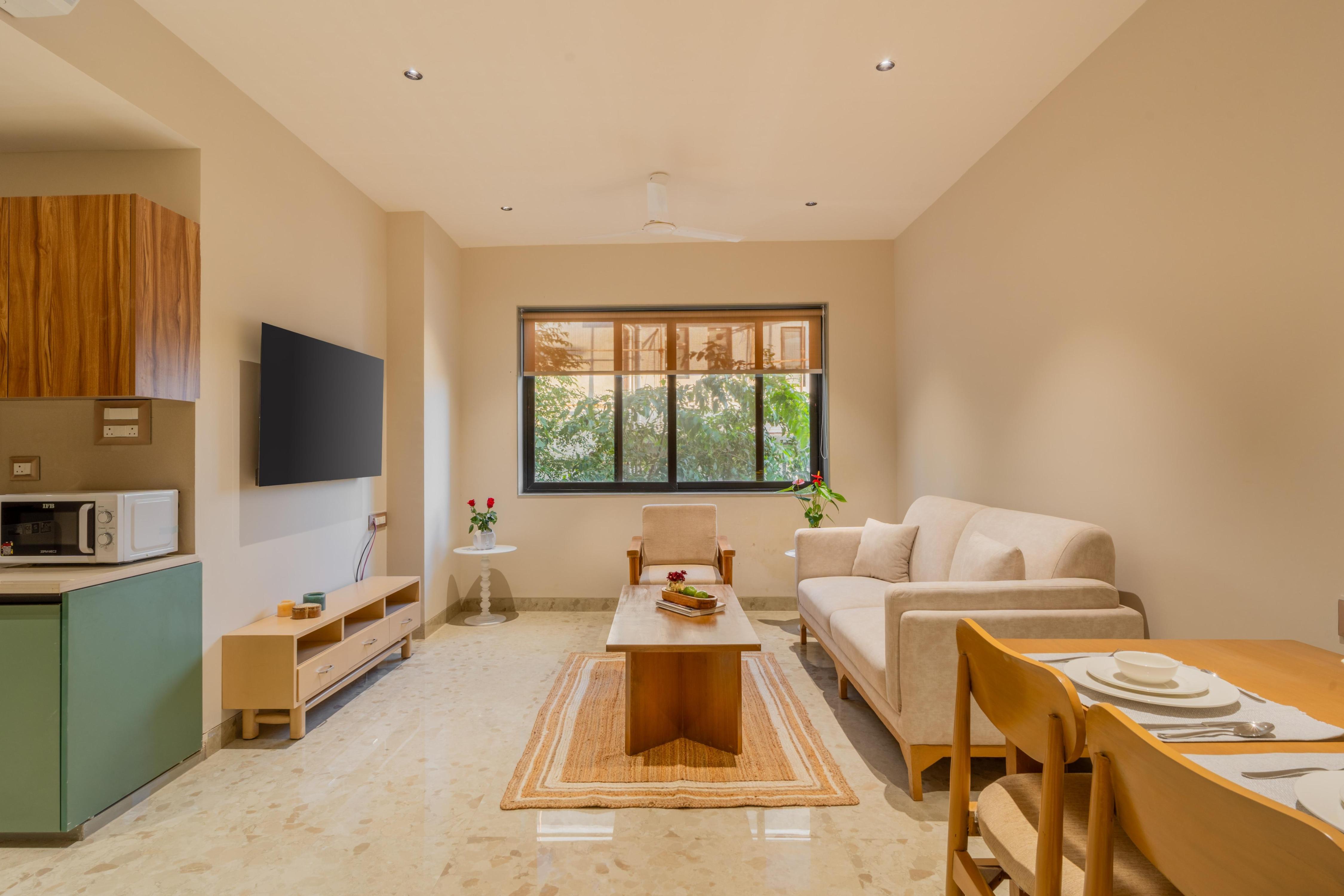 ELIVAAS Kamerios 1 BHK Apartments with shared Rooftop Pool - Tap to explore photos