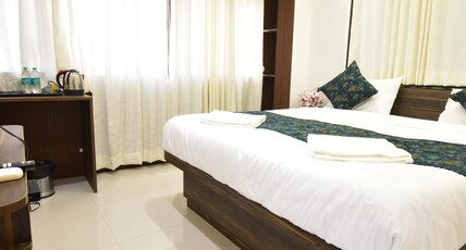 URBAN NEST Room Type - Deluxe Room with City View Bed